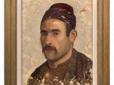 portrait of a man in a turban with a mustache and moustache