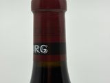 a bottle of wine that is sitting on a table