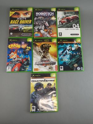 a bunch of video games sitting on top of a table