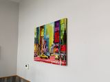 a picture of a painting hanging on a wall in a room