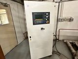 a machine that is sitting inside of a building