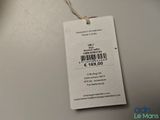 a tag on a table that has a price tag attached to it