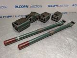 a group of four different types of tools sitting on top of a table