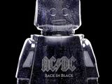 a black and white photo of a lego man with ac / dc logo on it