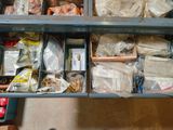 a drawer full of assorted items on a table