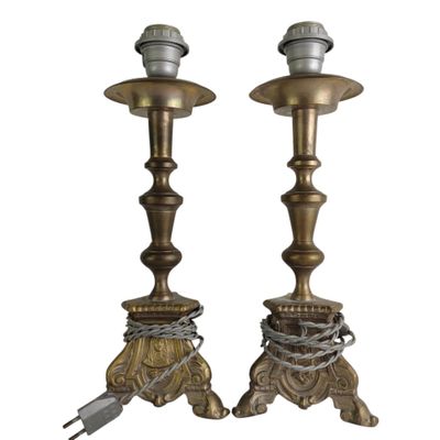 pair of antique brass candlesticks with chains and plugs