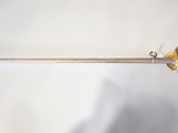 an image of a sword with a wooden handle on a white background