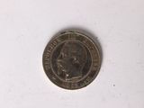 an old coin with a picture of a man on it