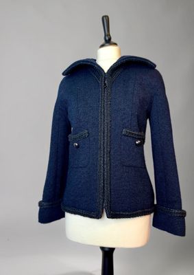 an image of a blue jacket on a mannequin