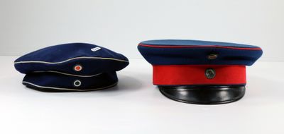 two hats sitting next to each other on a table