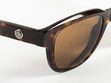 the sunglasses are made of tortoises and have brown lenses