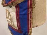 an image of a mannequin with a blue and red scarf on it