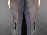 an image of a vest and tie on a mannequin