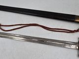 two different types of knives on a table