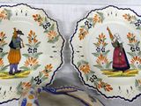 two plates with different designs on them on a table
