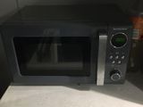 a microwave that is sitting on top of a counter