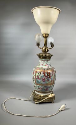 a lamp that is sitting on a table with a light on it