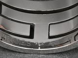 a close up of a toaster on a counter top