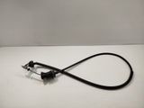 a close up of a black cord on a white surface