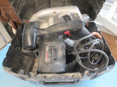 a tool in a case that is sitting on a table