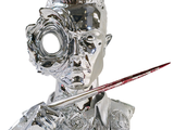 a silver sculpture of a man with a knife in his hand