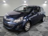 a picture of a blue car parked in a garage