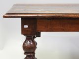 an old wooden table with a wooden top on a white background