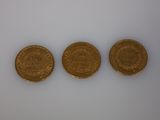 three gold coins, one of which is a sovereign sovereign sovereign sovereign sovereign sovereign sovereign sovereign sovereign sovereign sovereign sovereign sovereign sovereign sovereign sovereign sovereign sovereign sovereign sovereign sovereign sovereign sovereign