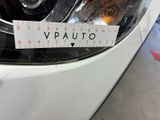 a sticker on the front of a car that says v - auto