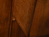 close up of a wooden drawer with a drawer underneath it