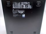 the back of a laptop with a black back panel and a white back panel