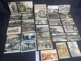 many old postcards that are on a black table
