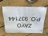 a picture of a sign on a wooden door