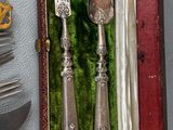 silverware in a red case with a green velvet lining