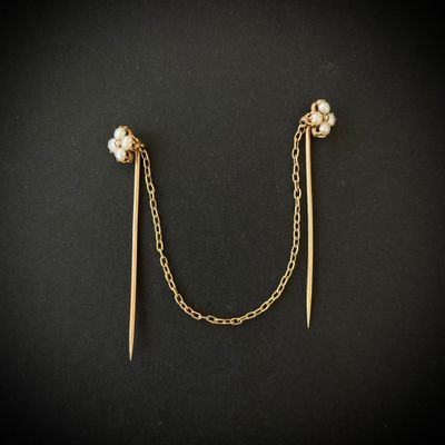 Double épingles de col en or rose 750°°°, à motif quadrilobé…