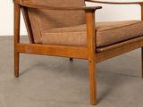an image of a chair in a room with concrete flooring
