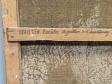 a close up of a piece of fabric on a wooden frame