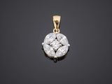 an 18k yellow gold and diamond pendant