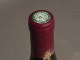 a bottle of wine that is sitting on a table