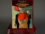 a red book with a picture of a man in a priest ' s robes