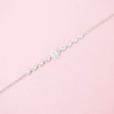 Bracelet "Fleurette" en or blanc 18K (750/oo), serti de dix-…