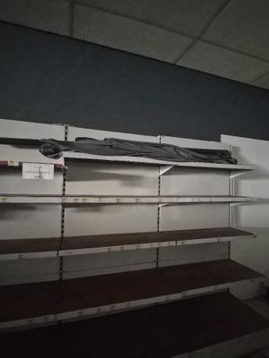 a empty shelf in the middle of a room