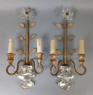 pair of brass and glass wall sconces with flowers and leaves
