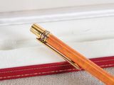 a pen that is sitting in a box on a table