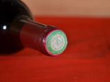 a bottle of wine that is sitting on a table