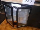 a glass door that is open on a wooden floor