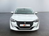 the front view of a white car in a white room