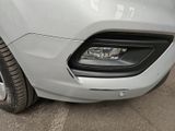 a close up view of a car ' s front bumper and headlight
