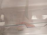 an open refrigerator door with some food inside of it