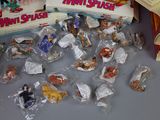 a lot of toys that are sitting on a table